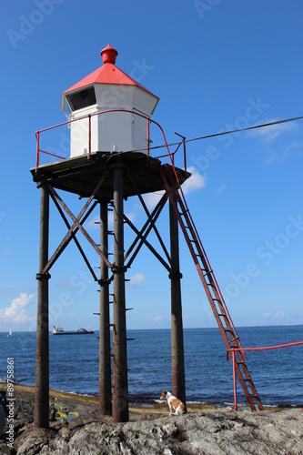 Small lighthouse in Norway  Europe. On the beach of Haugesund  situated between Bergen and Stavanger.