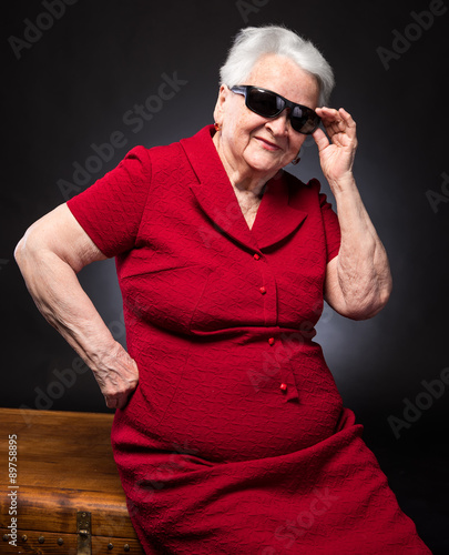 Old woman in sunglasses
