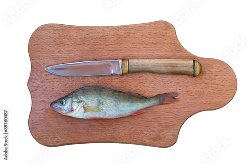 perch and a knife on a cutting board