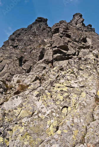 view to sharp rock towers from Zleb Kulczynskiego on Orla Perc hiking trail in Tatry mountains