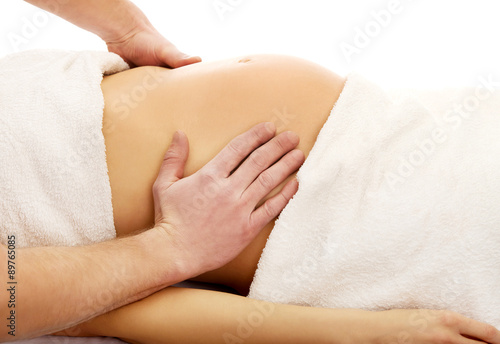 Pregnant woman having a relaxing massage