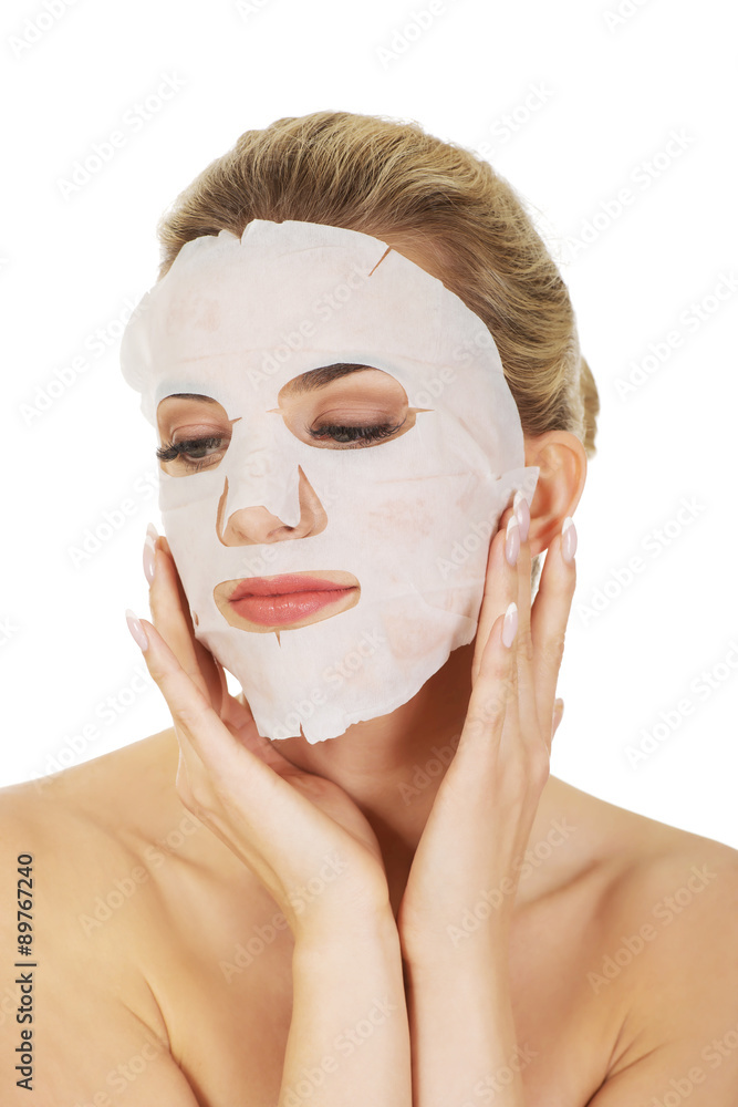 Young happy woman with facial mask. Young happy woman with facial mask.