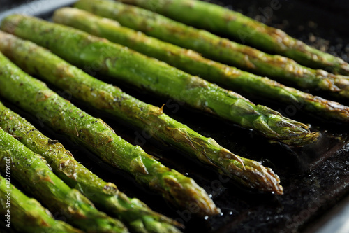 Vászonkép Roasted asparagus on pan, close-up