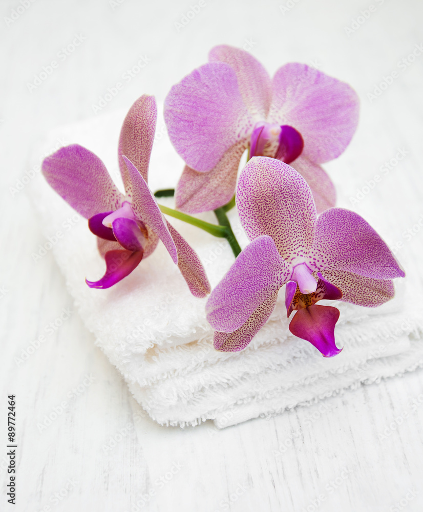 Pink orchids and towels Pink orchids and towels