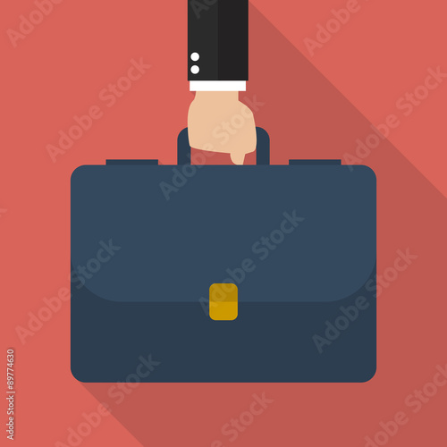 Businessman hand holding briefcase