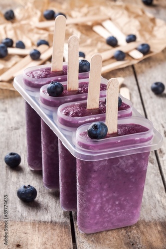 Homemade popsicles with blueberry and yogurt