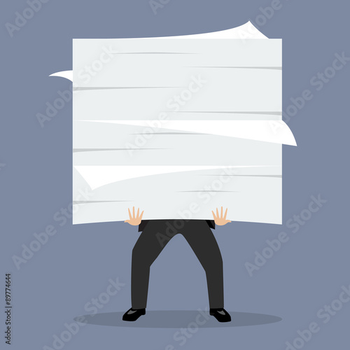 Businessman holding a lot of documents