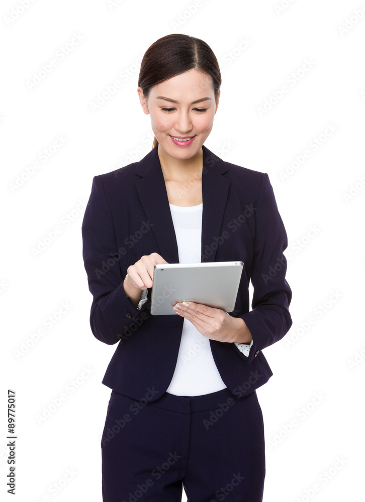Businesswoman use of the tablet pc Businesswoman use of the tablet pc