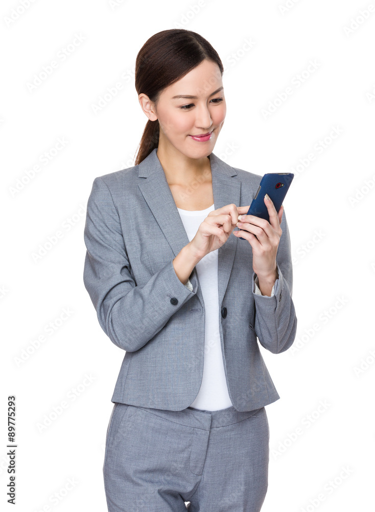 Young businesswoman use of the cellphone Young businesswoman use of the cellphone