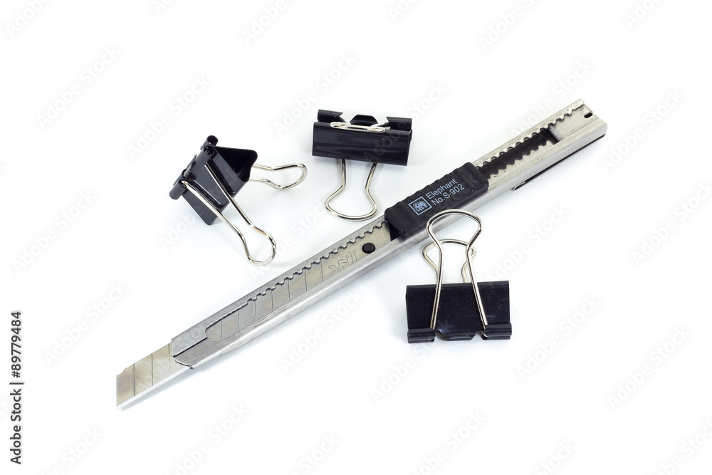 Obraz premium black paper clip and cutter