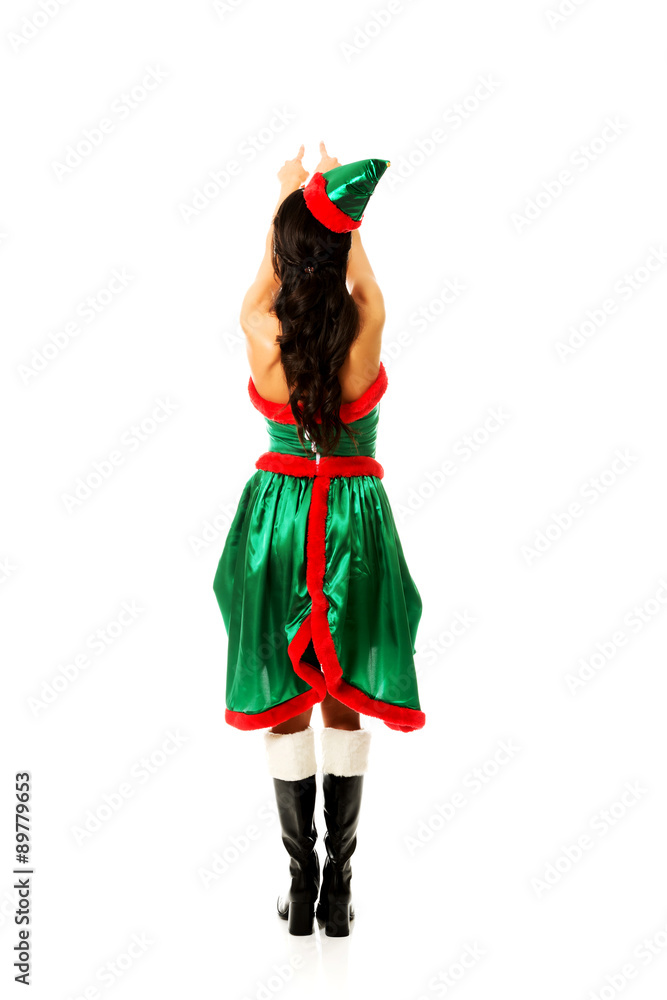Woman wearing elf clothes Woman wearing elf clothes
