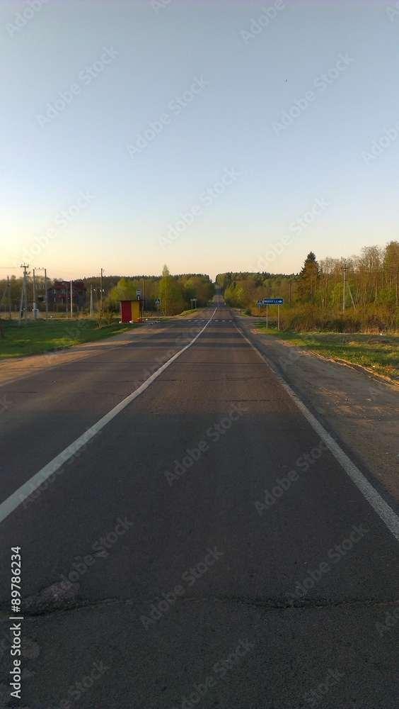 Empty road in spring evening Empty road in spring evening