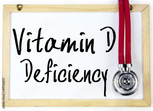 vitamin d deficiency text write on blackboard photo