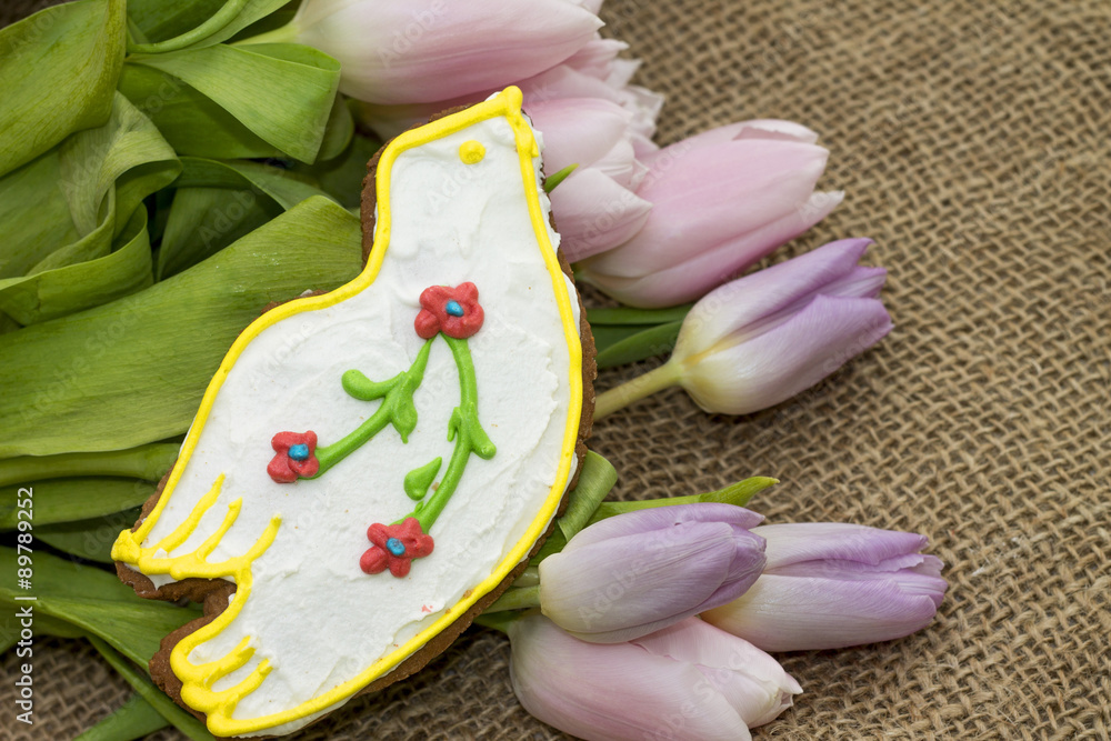 Tasty glazed gingerbread and bouquet of tulips Tasty glazed gingerbread and bouquet of tulips