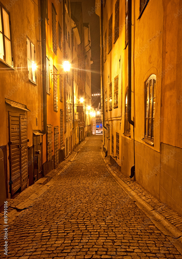 Narrow street at night in Stockholm