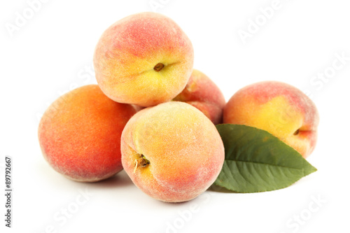 Fresh peaches fruit isolated on a white