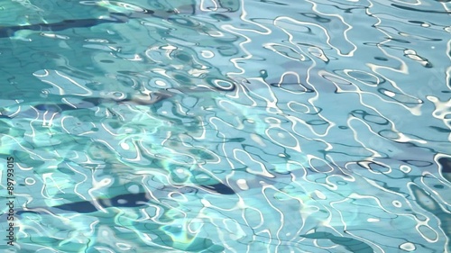 Footage of a swimming pool and the water flowing in it...
