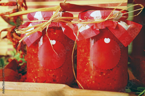 Two jars of homemade spicy salsa.