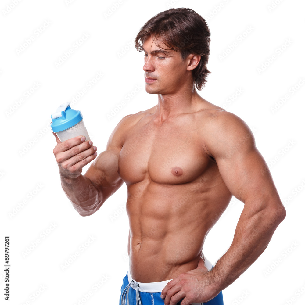 Muscular man with protein drink in shaker Muscular man with protein drink in shaker