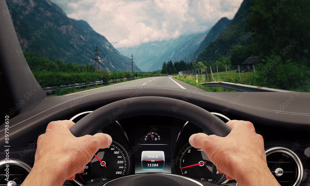 Fototapeta premium Driving hands steering wheel 