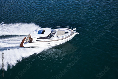Aerial shot of a beautiful motor boat © Image Supply Co