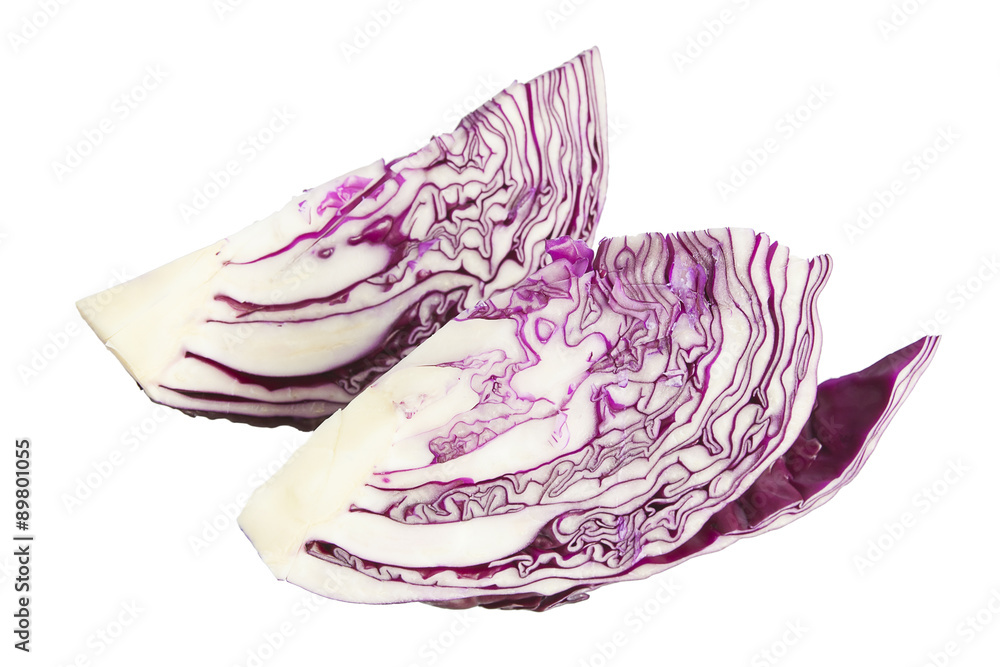 Two pieces of freshly chopped purple cabbage isolated on white. Two pieces of freshly chopped purple cabbage isolated on white.