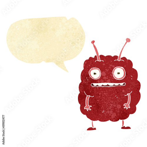 cartoon funny alien monster with speech bubble
