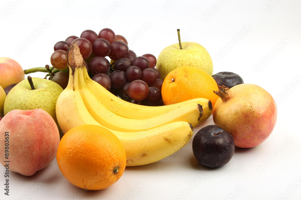 Assortment of fresh fruits isolated on white