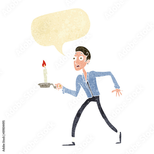 cartoon frightened man walking with candlestick with speech bubb photo