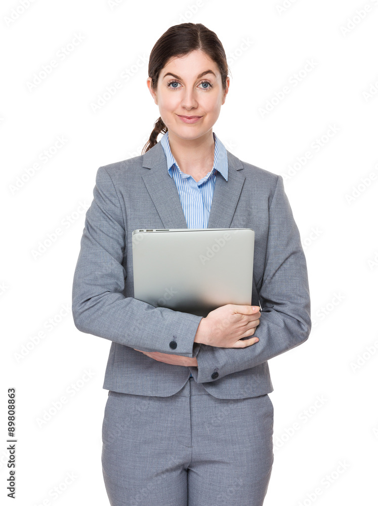 Brunette businesswoman hold with laptop computer Brunette businesswoman hold with laptop computer