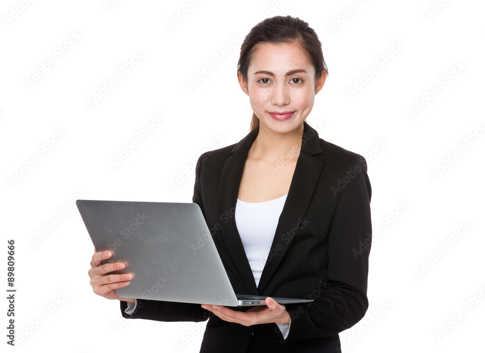 Asian Young businesswoman use of the notebook computer Asian Young businesswoman use of the notebook computer