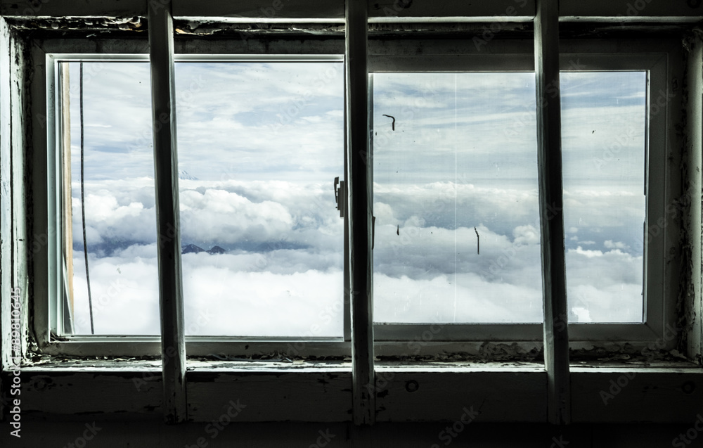 Fototapeta premium Window Above Clouds