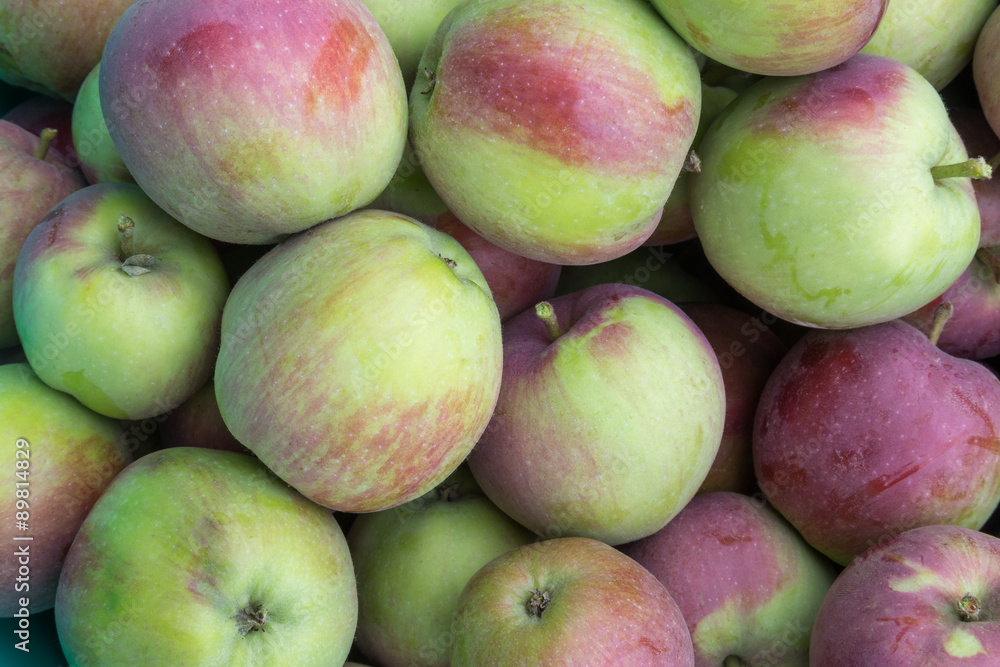 Organic apples gathered in a basket closeup Organic apples gathered in a basket closeup