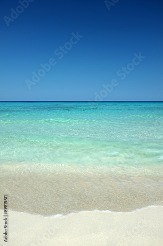 Shoreline of a beautiful beach with clear water