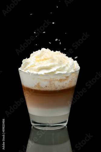 coffe latte cup on the black background