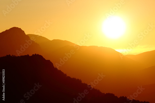 Back light of a sunset on a mountain © Antonioguillem