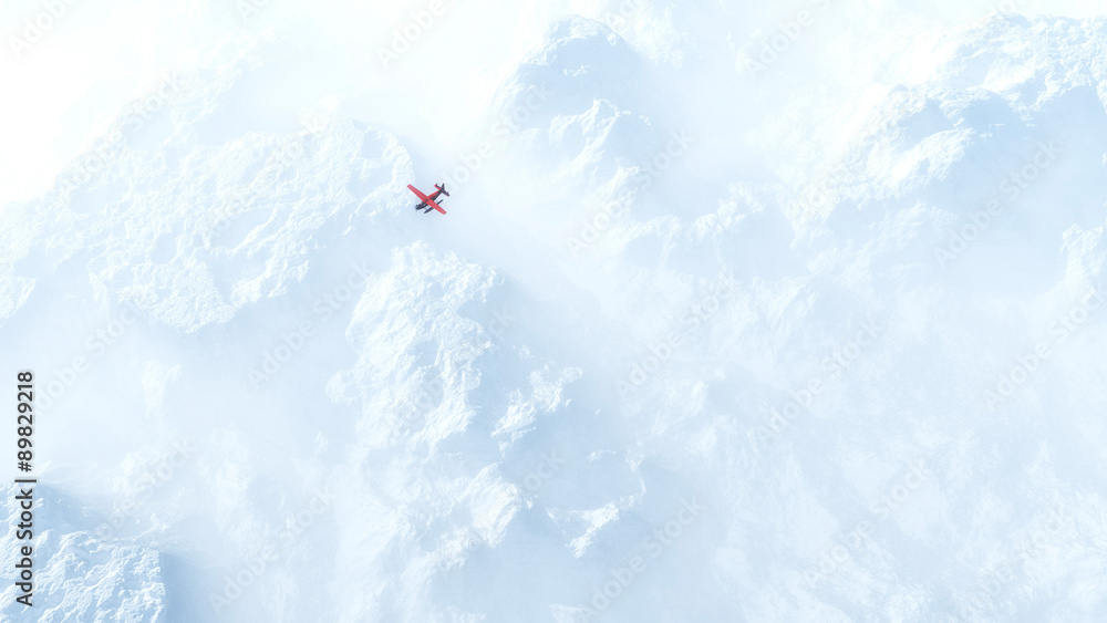 Small red airplane flying over snow mountains in the mist. High