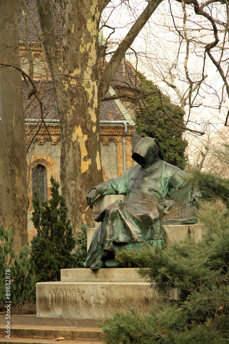 Statue of Anonymus in Budapest's City Park  in the courtyard of Vajdahunyad Castle photo