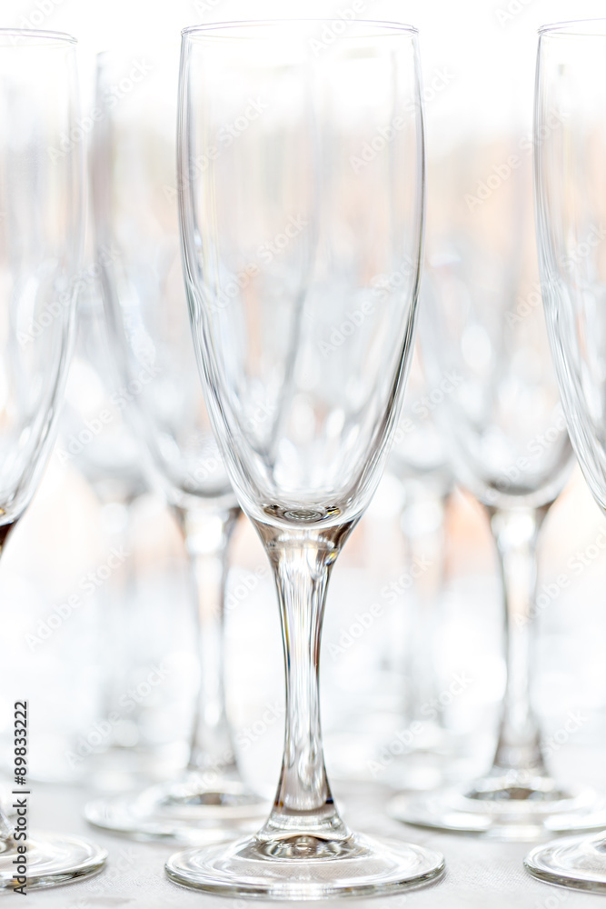 Glasses for drinks and cocktails at the festive table. toned