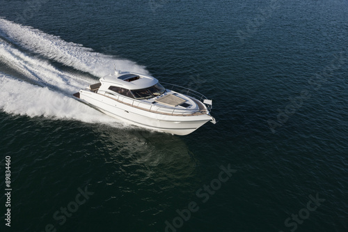 Elegant yacht sailing through the sea © Image Supply Co