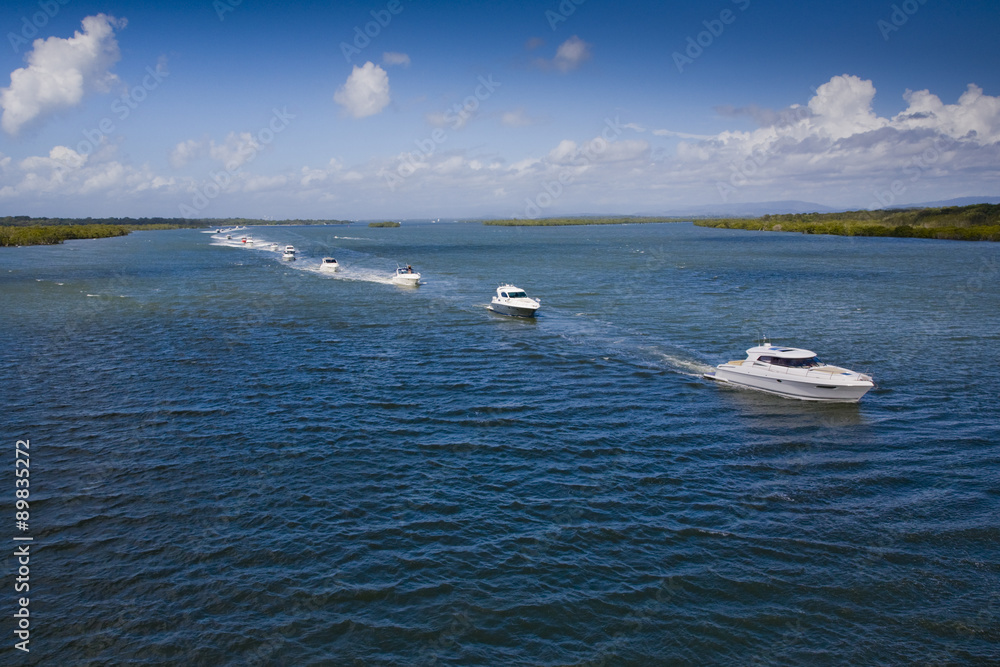 A group of small motor boats in the sea