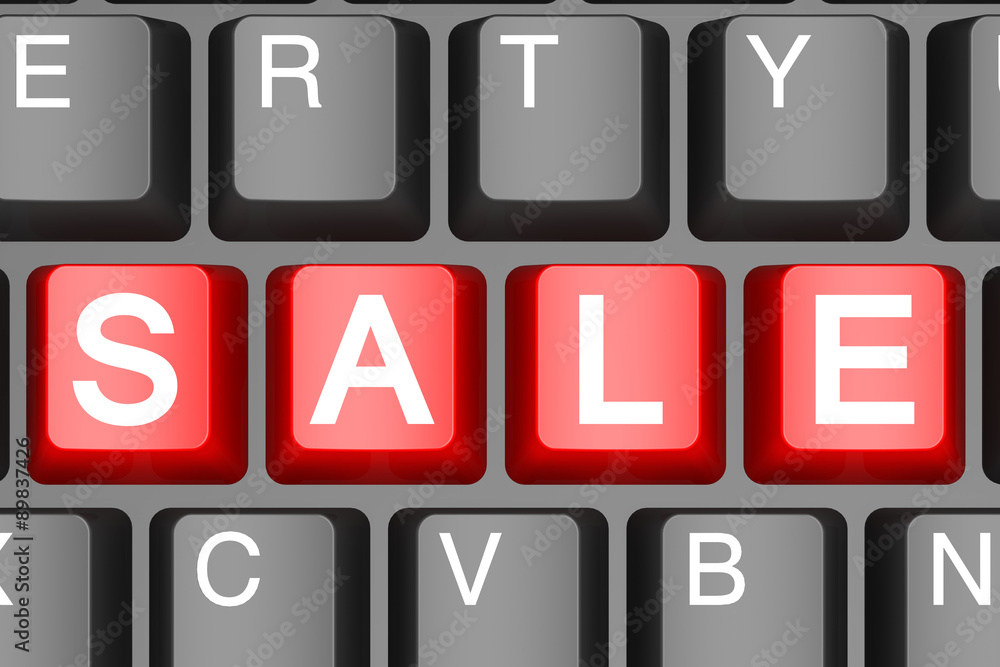 Red sale button on modern computer keyboard Red sale button on modern computer keyboard