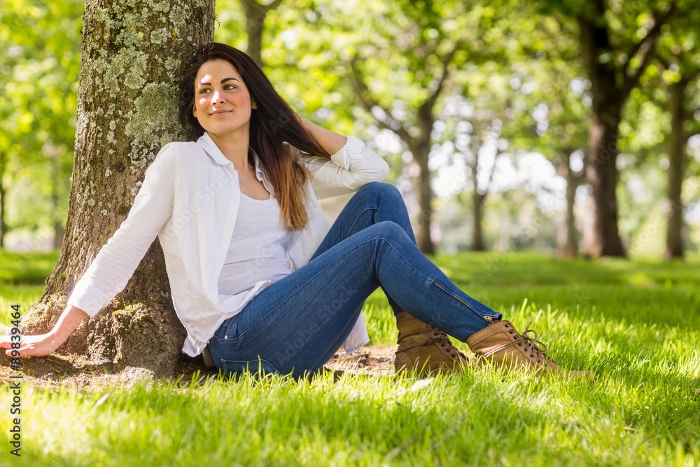 Beautiful brunette relaxing in the park Beautiful brunette relaxing in the park