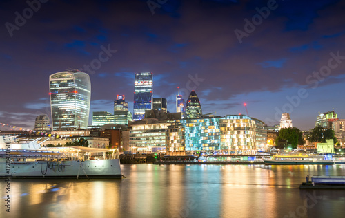 Night lights of London. Buildings reflections near river Thames © jovannig