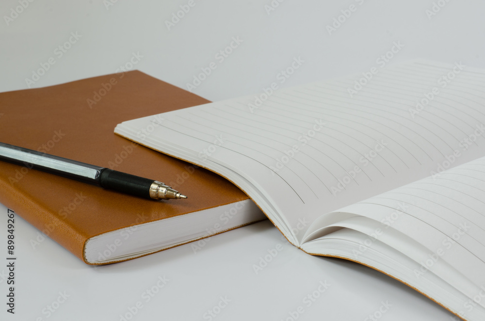 Notebook Open and Pen On White Background. Notebook Open and Pen On White Background.