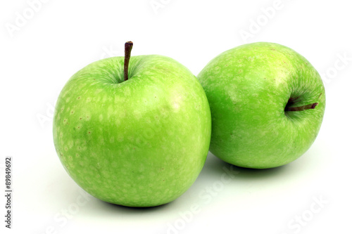 Two shiny green apple