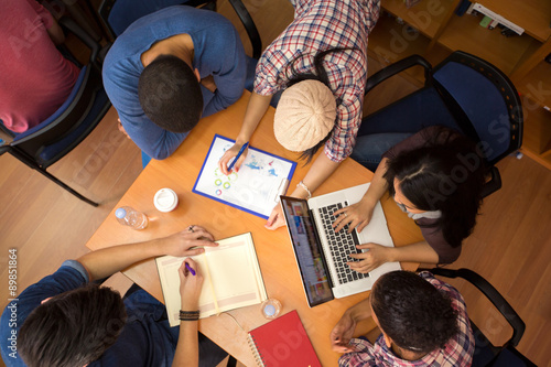 Принти на полотні Top view of group of colleagues working