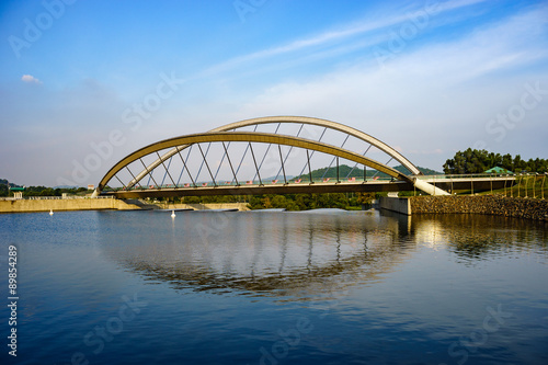 Fototapeta Naklejka Na Ścianę i Meble -  Modern architecture design of a pedestrian bridge in Putrajaya, Malaysia