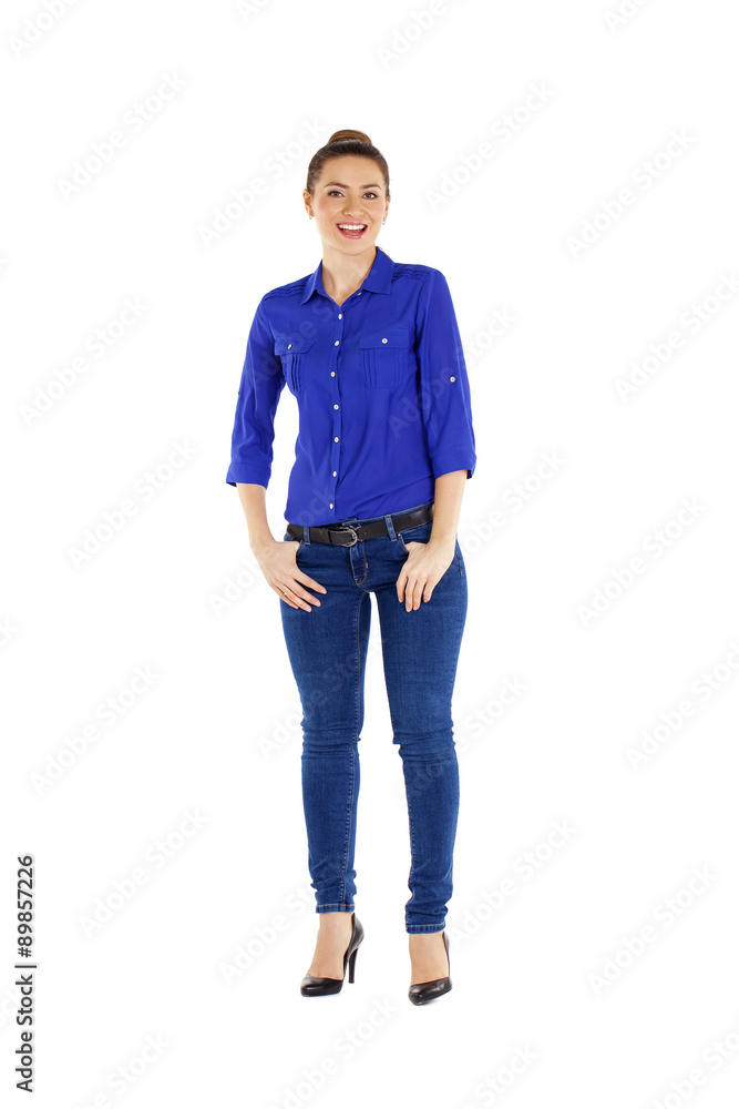 Portrait of a beautiful woman in blue jeans and blue shirt Portrait of a beautiful woman in blue jeans and blue shirt