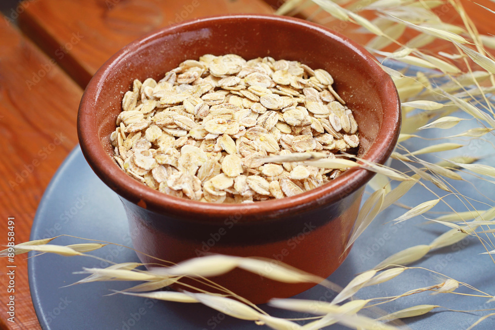 Oats cereal, cereals, rustic, wooden, background, diet breakfast, healthy lifestyle Oats cereal, cereals, rustic, wooden, background, diet breakfast, healthy lifestyle